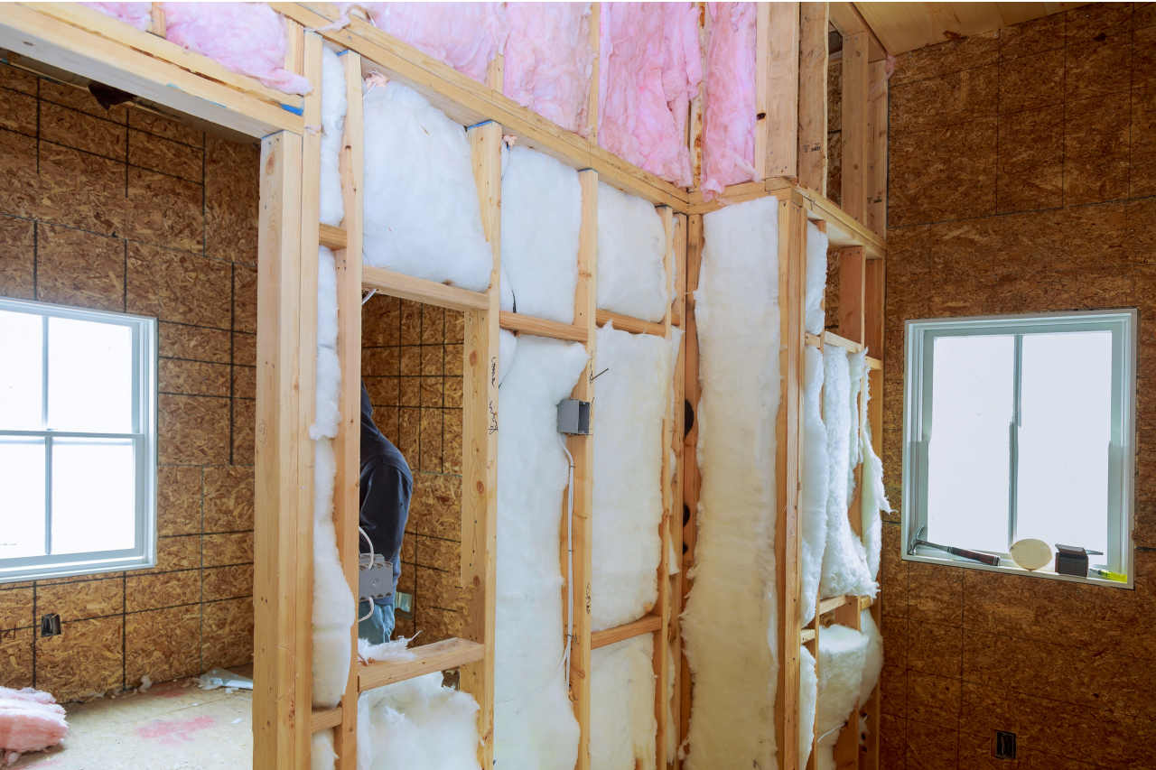 Building under construction and renovation inside wall heat isolation with mineral wool in wooden