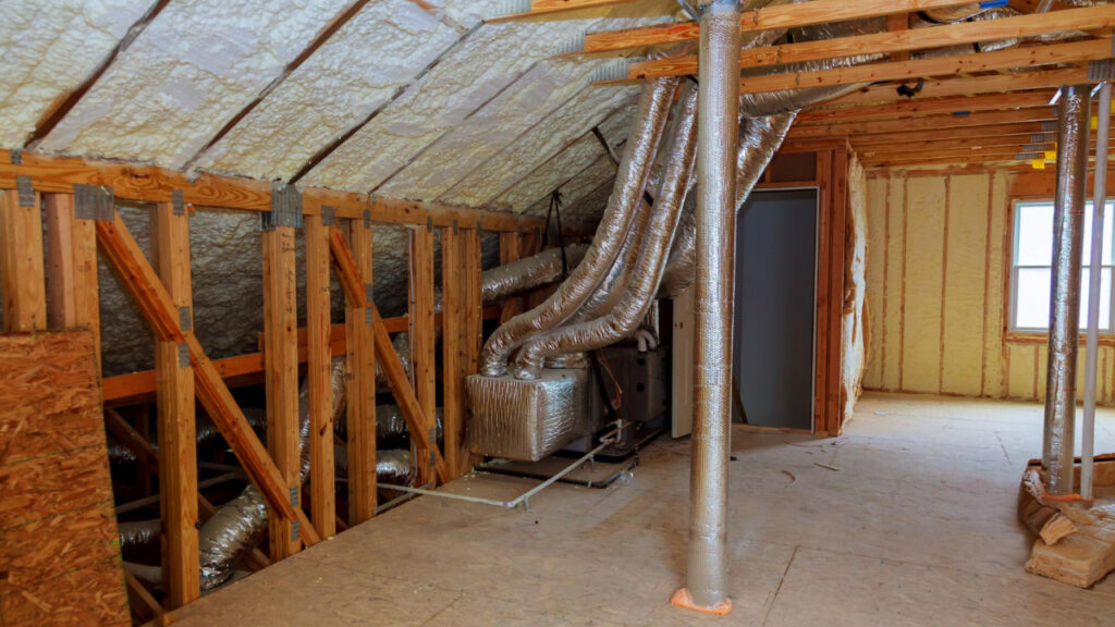 installing ducts in attic insulation for proper ventilation