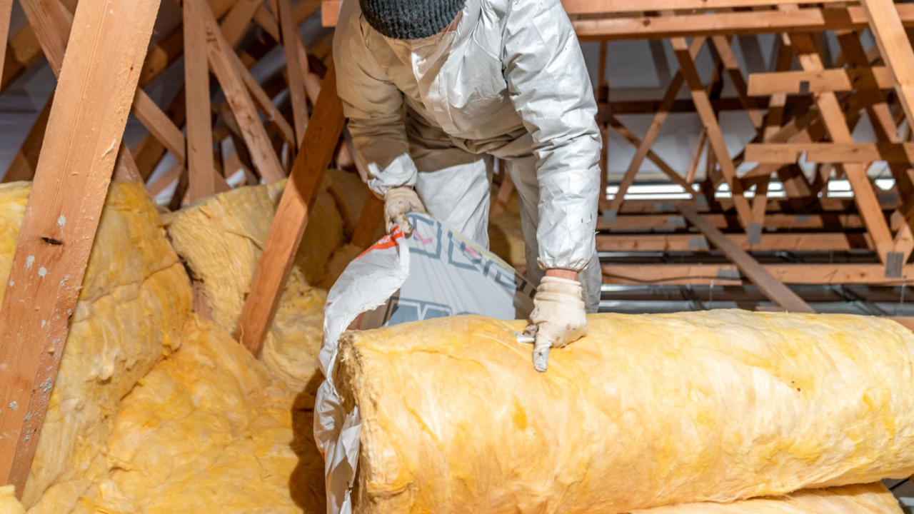 insulation specialist repairing and installing new insulation